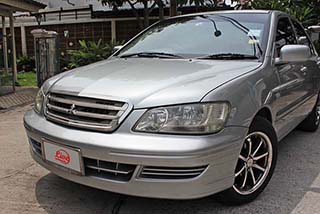 รับซื้อรถยนต์ Mitsubishi Lancer 2004